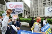 コロナ下で五輪開催にWHO沈黙は「責任逃れ」、英医学誌がリポート